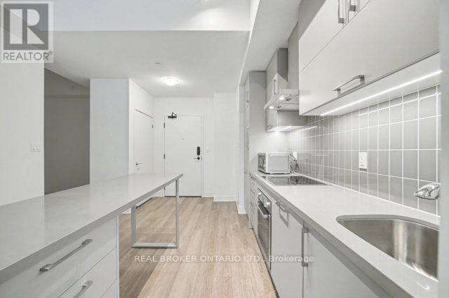 Open Concept - 921 - 56 Andre De Grasse Street S, Markham, ON - Indoor Photo Showing Kitchen