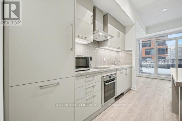 Built-In Fridge - 921 - 56 Andre De Grasse Street S, Markham, ON - Indoor Photo Showing Kitchen
