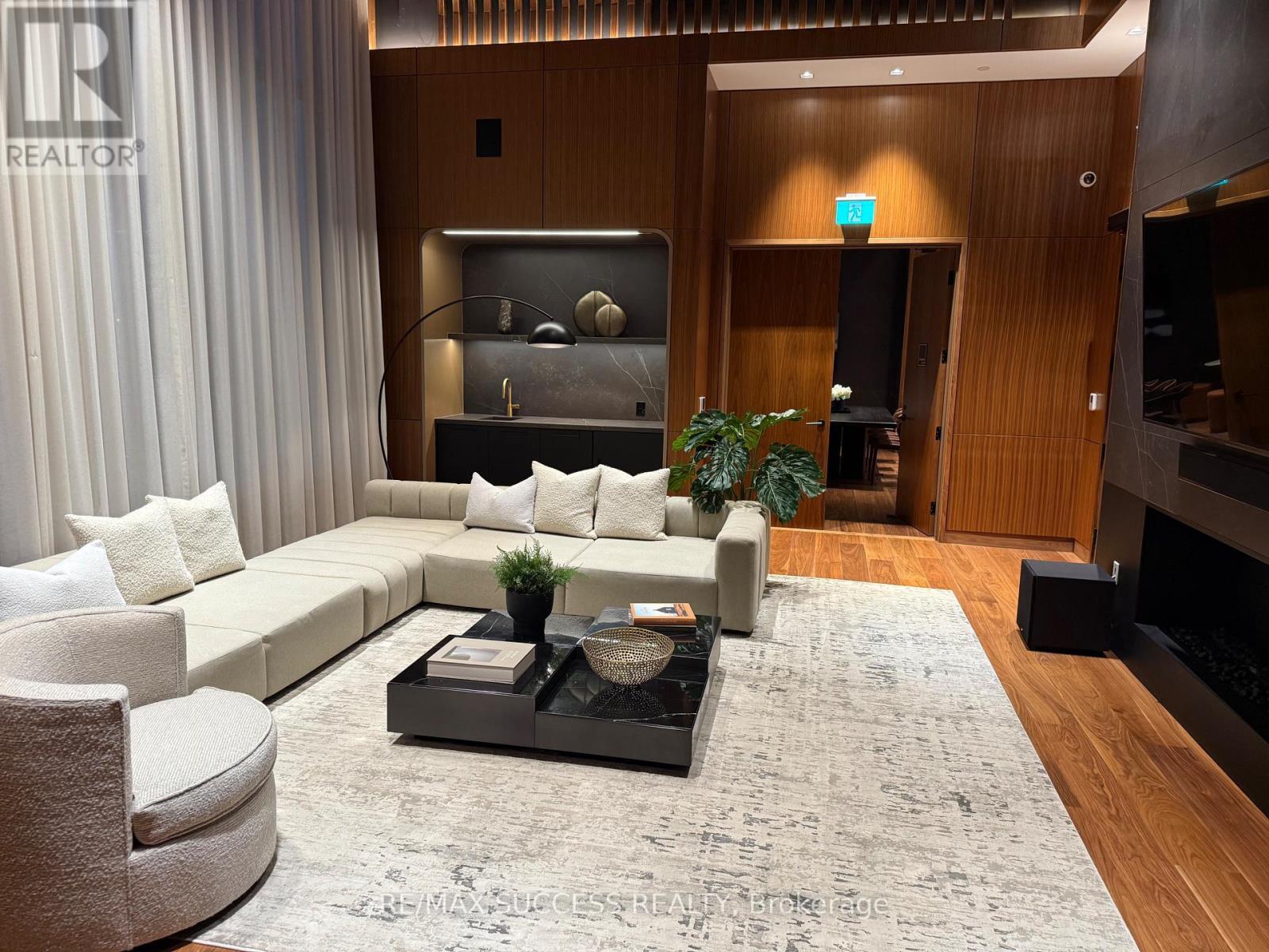 1205 - 3240 William Coltson Ave Avenue, Oakville, ON - Indoor Photo Showing Living Room With Fireplace