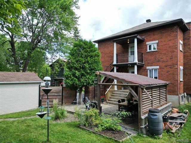 Backyard - 130B-130 Av. Du Pacifique, Laval (Laval-Des-Rapides), QC - Outdoor With Exterior