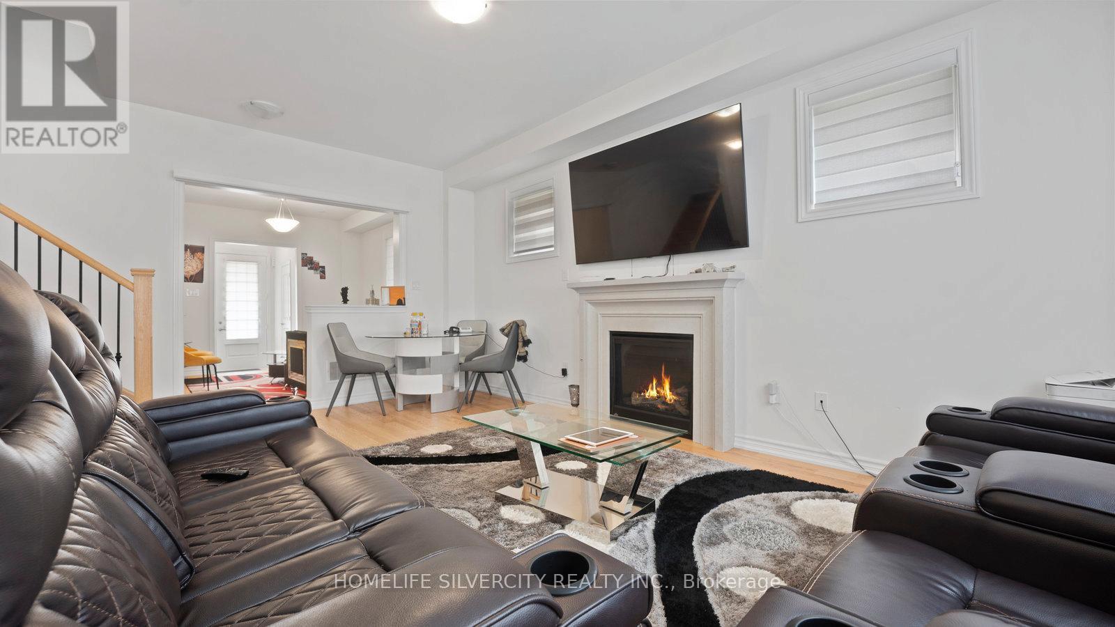 102 Strickland Avenue, Brantford, ON - Indoor Photo Showing Living Room With Fireplace