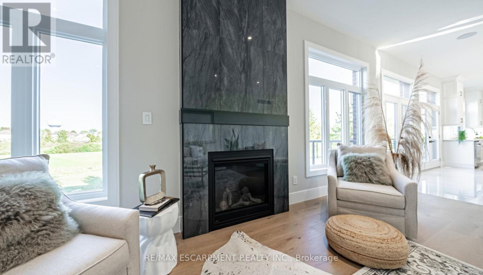 73 Workman Crescent, Blandford-Blenheim, ON - Indoor Photo Showing Living Room With Fireplace