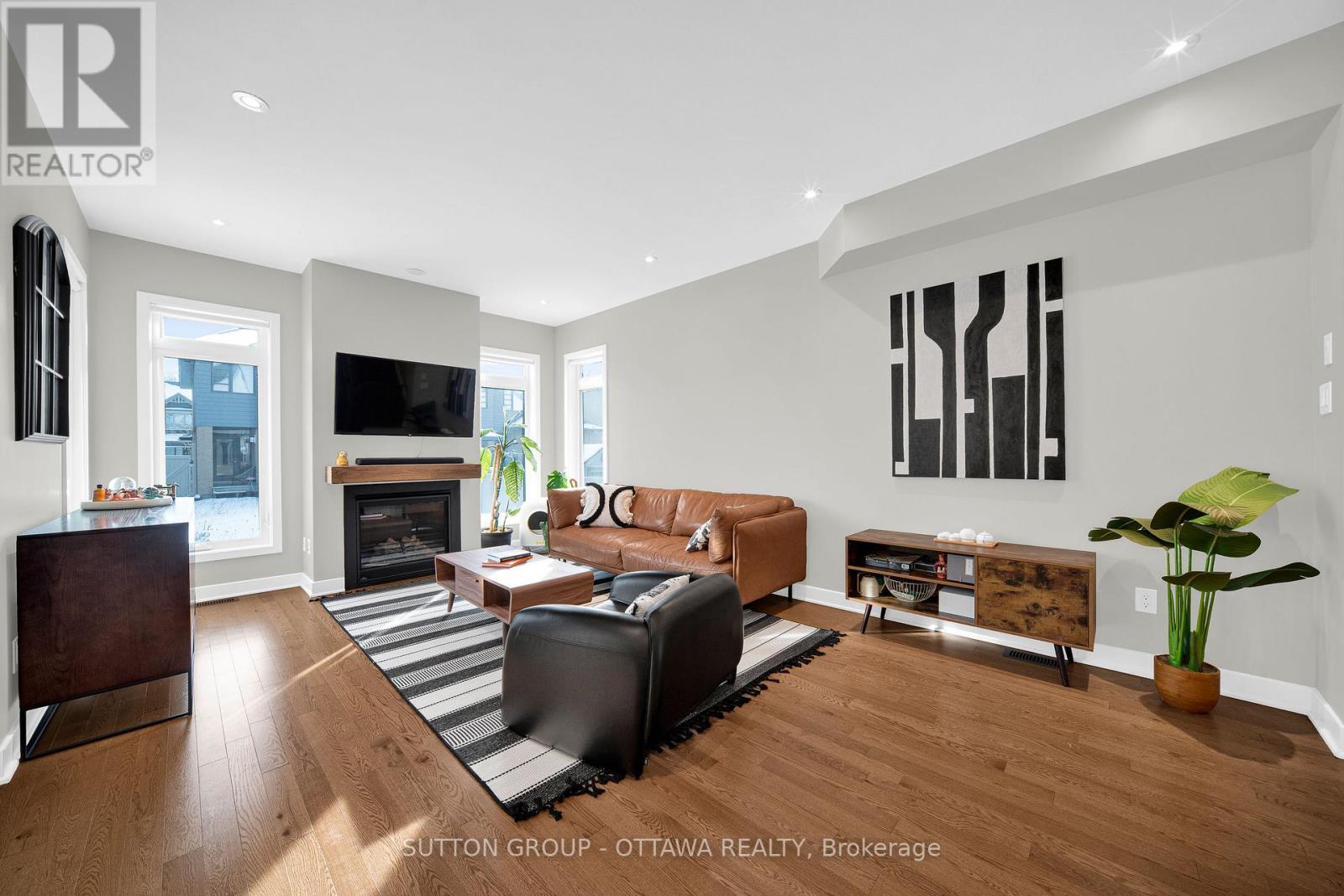 726 Octave Grove, Ottawa, ON - Indoor Photo Showing Living Room With Fireplace