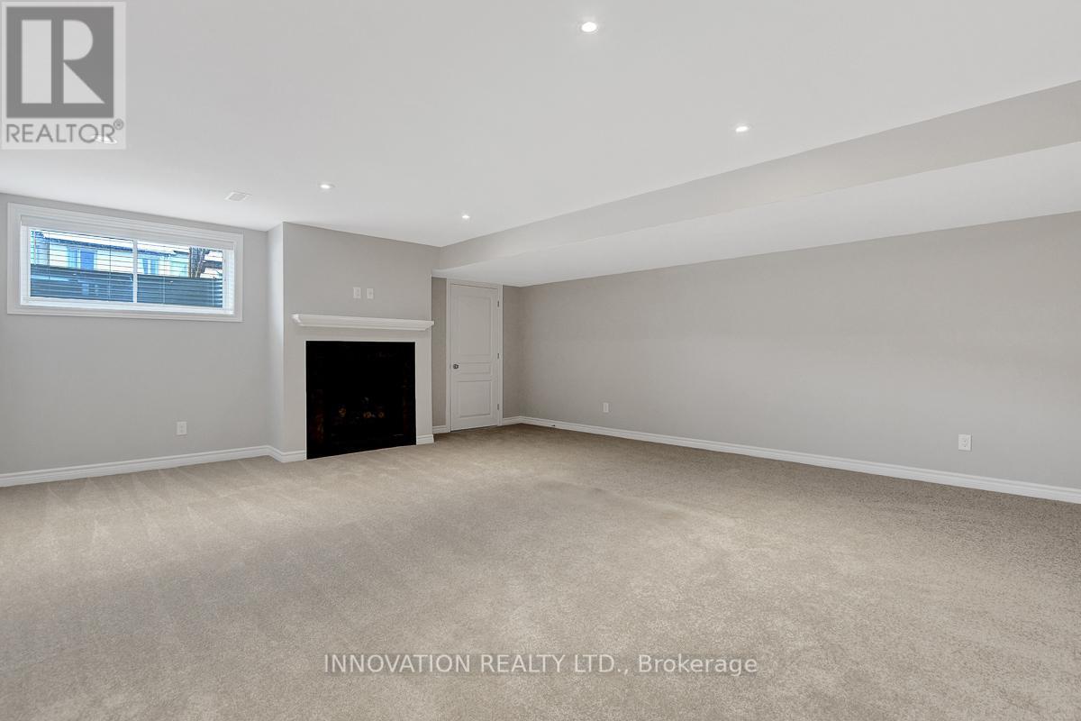 527 Rowers Way, Ottawa, ON - Indoor Photo Showing Other Room With Fireplace