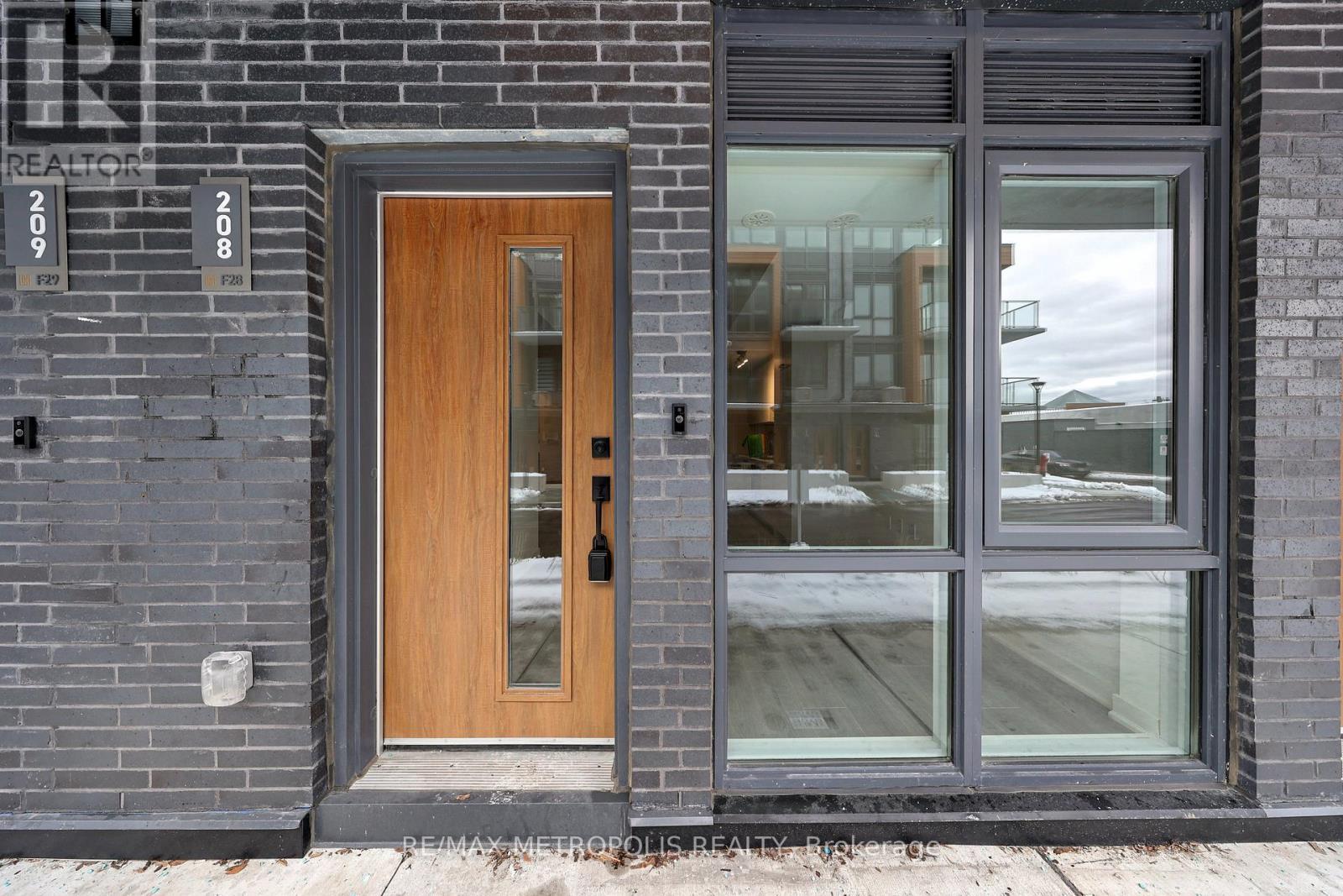 208 - 65 Curlew Drive, Toronto, ON - Outdoor