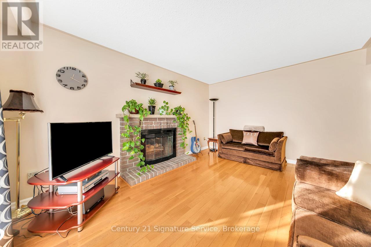 27 Northampton Street, Brampton, ON - Indoor Photo Showing Other Room With Fireplace