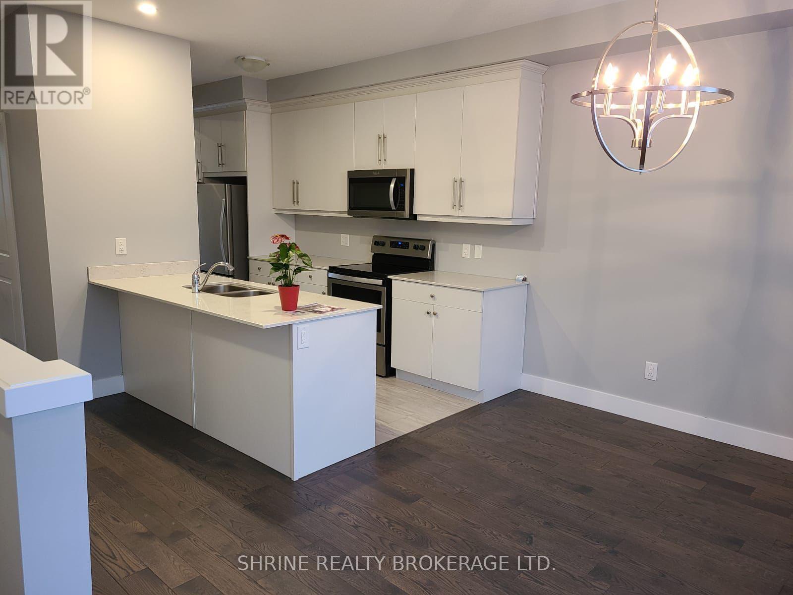 51 - 2070 Meadowgate Boulevard, London South (South U), ON - Indoor Photo Showing Kitchen With Double Sink