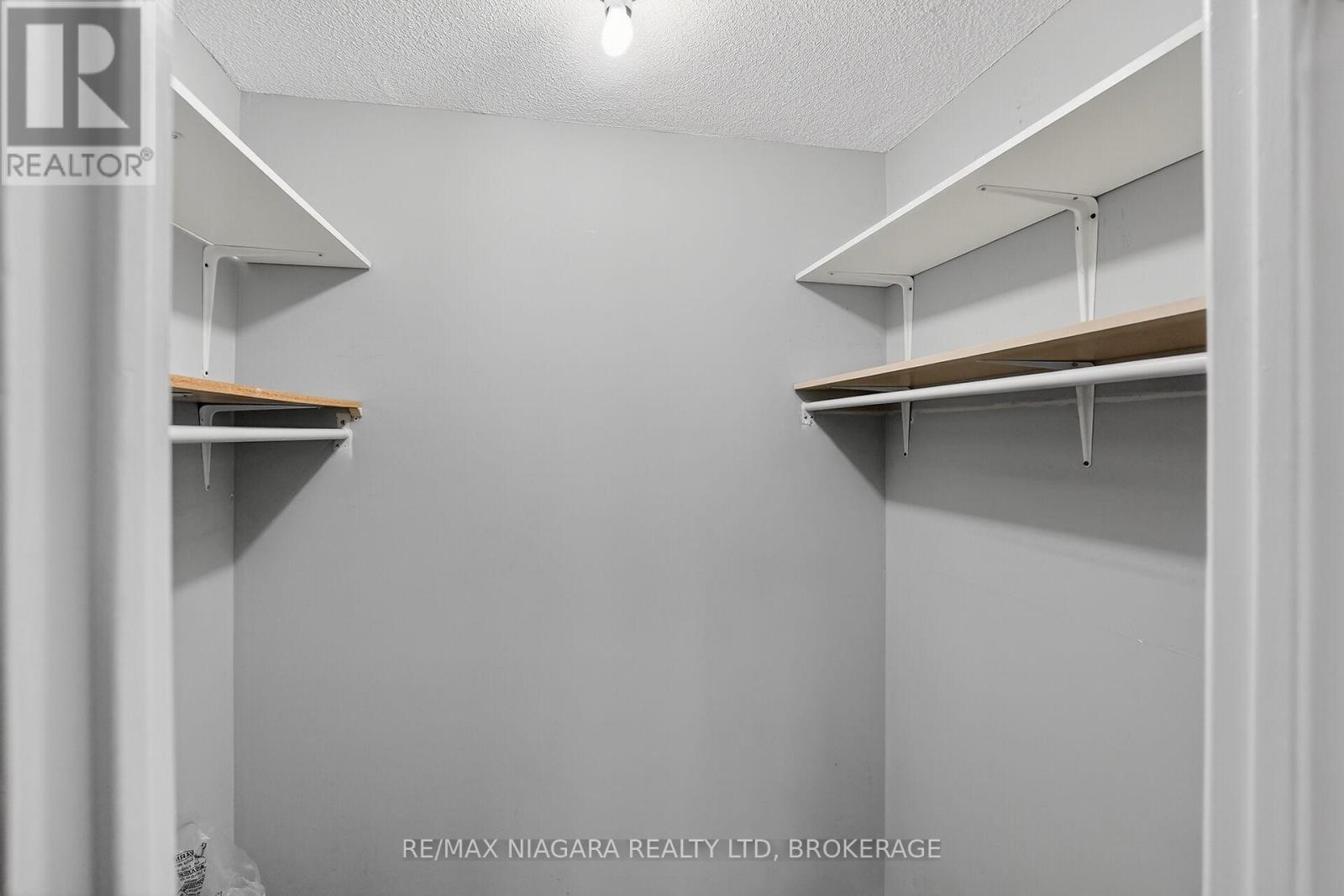walk-in closet - 911 - 81 Scott Street, St. Catharines (Lakeport), ON - Indoor With Storage