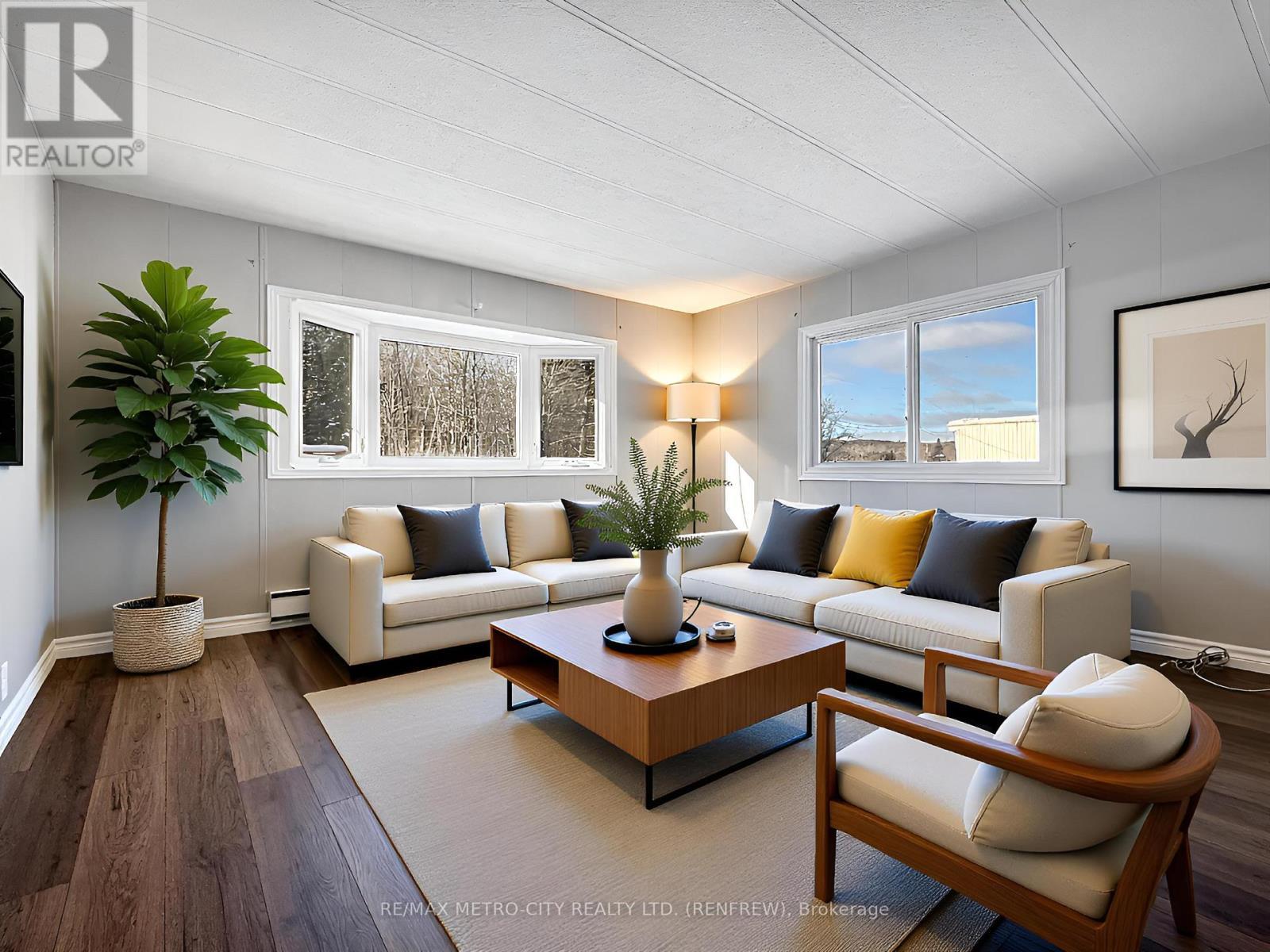 Virtually Staged - 33 Julie Lane, Horton, ON - Indoor Photo Showing Living Room