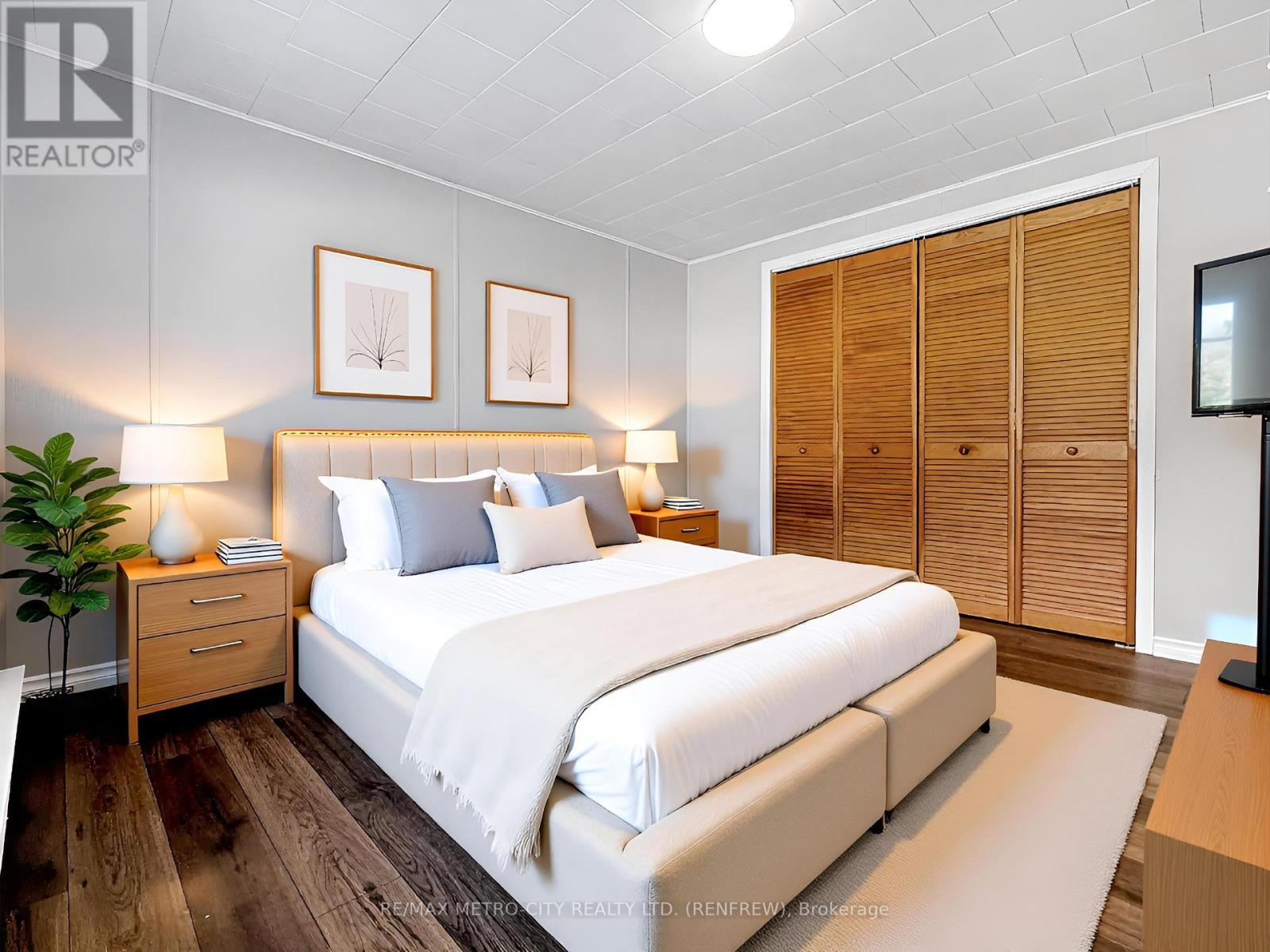 Virtually Staged - 33 Julie Lane, Horton, ON - Indoor Photo Showing Bedroom