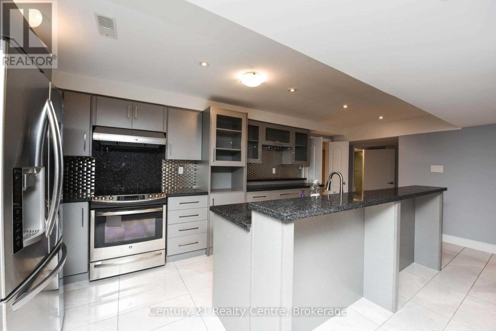 49 Riseborough Drive, Brampton, ON - Indoor Photo Showing Kitchen With Upgraded Kitchen