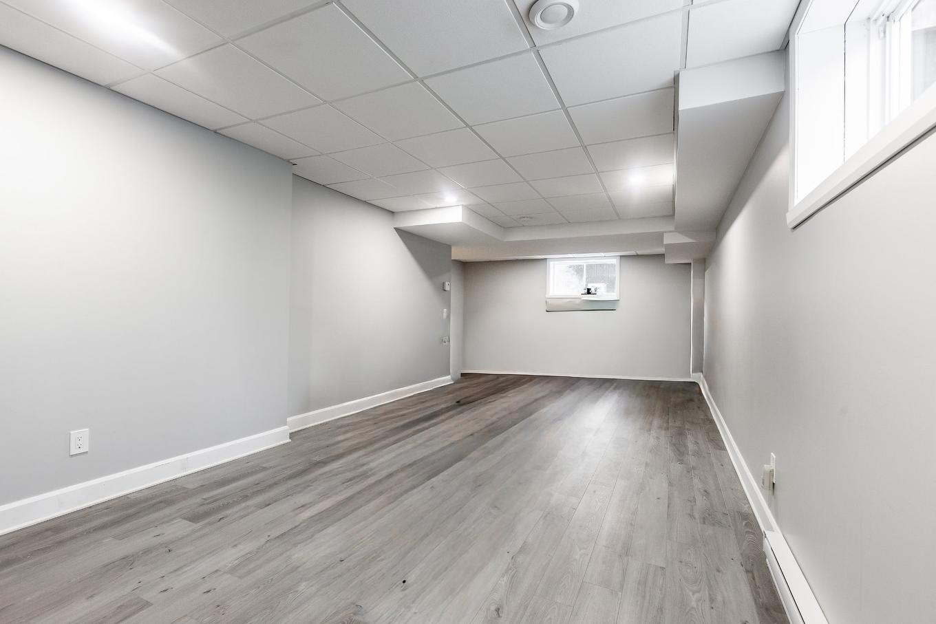 Family room - 615 Rue Leblanc, Saint-Lin/Laurentides, QC - Indoor Photo Showing Basement