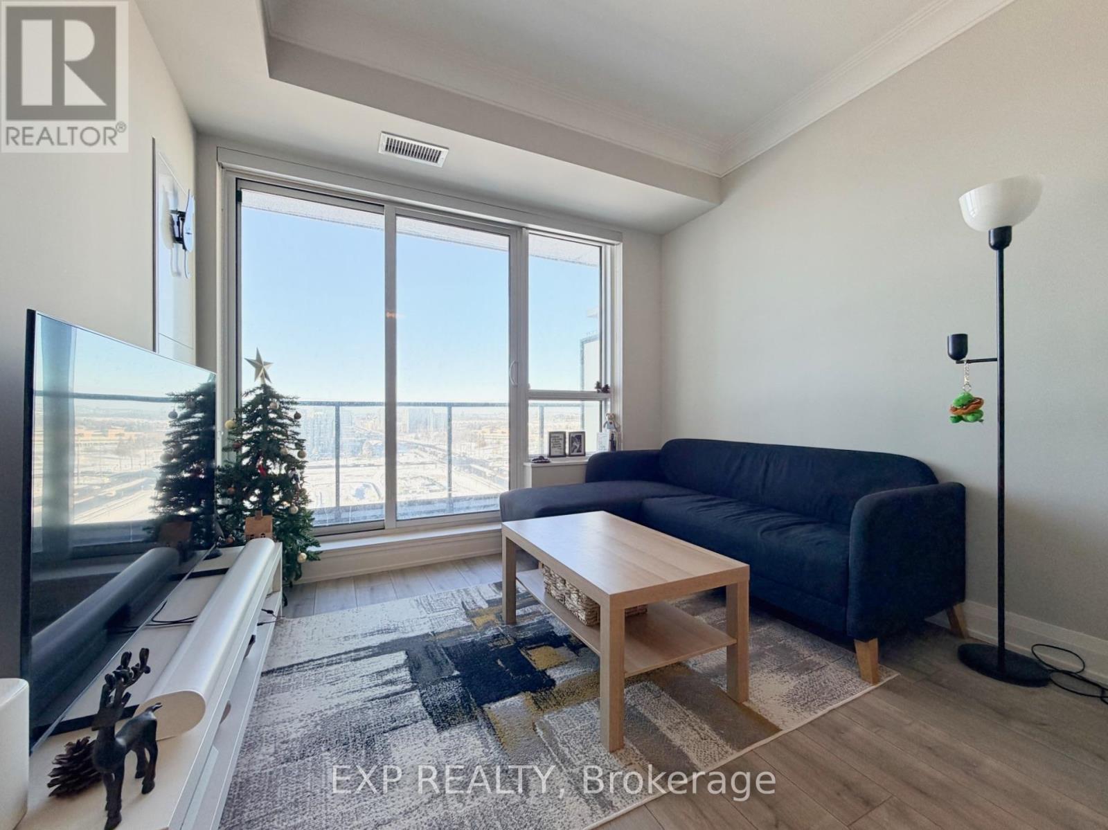 1807 - 18 Water Walk Drive, Markham, ON - Indoor Photo Showing Living Room