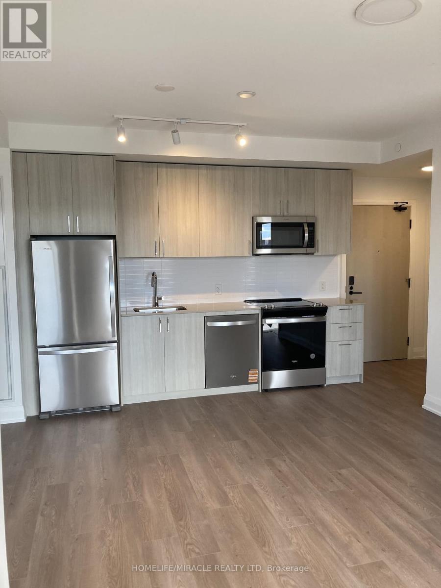 303 - 3250 Carding Mill Trail, Oakville, ON - Indoor Photo Showing Kitchen With Stainless Steel Kitchen