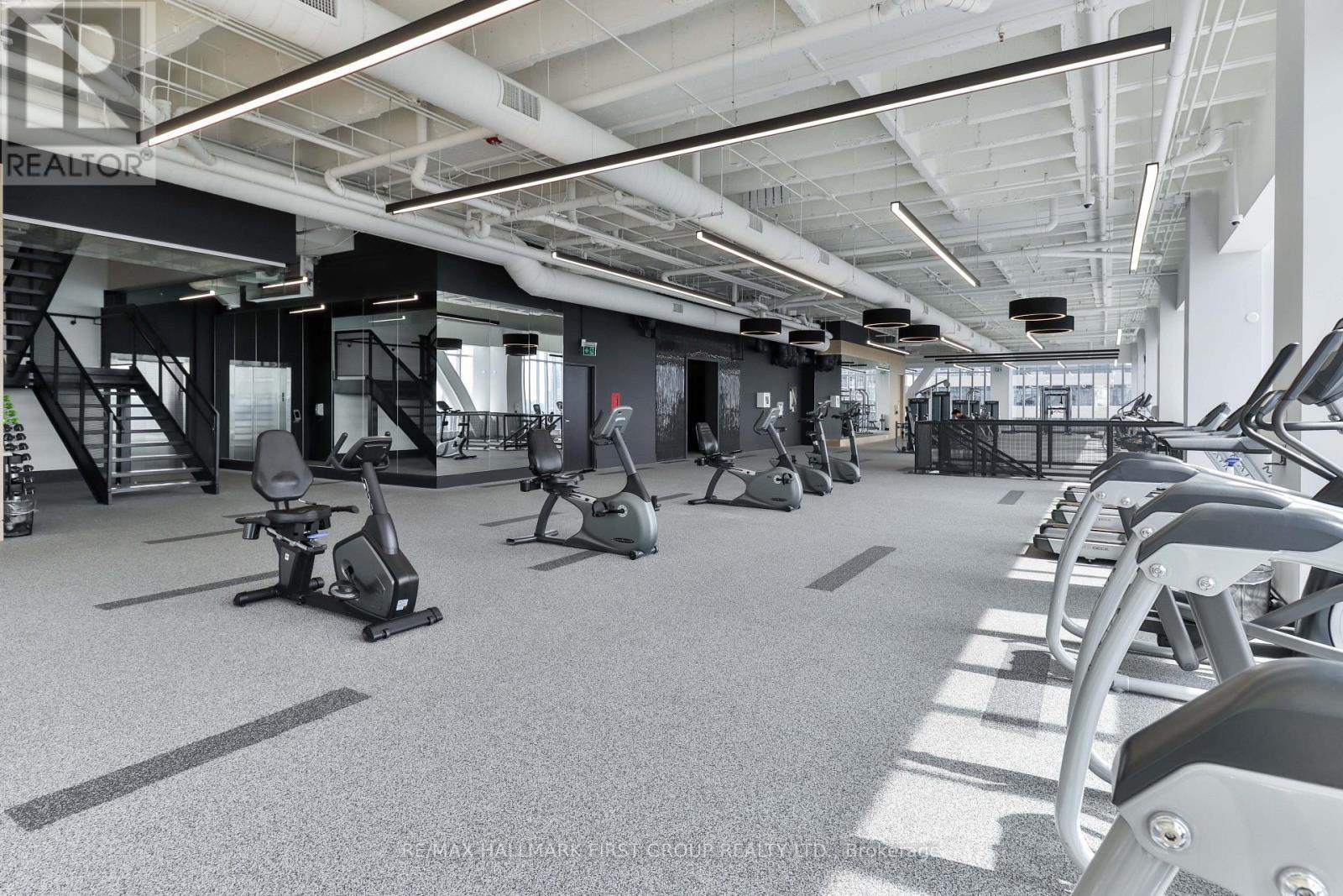 2402 - 488 University Avenue, Toronto (University), ON - Indoor Photo Showing Gym Room