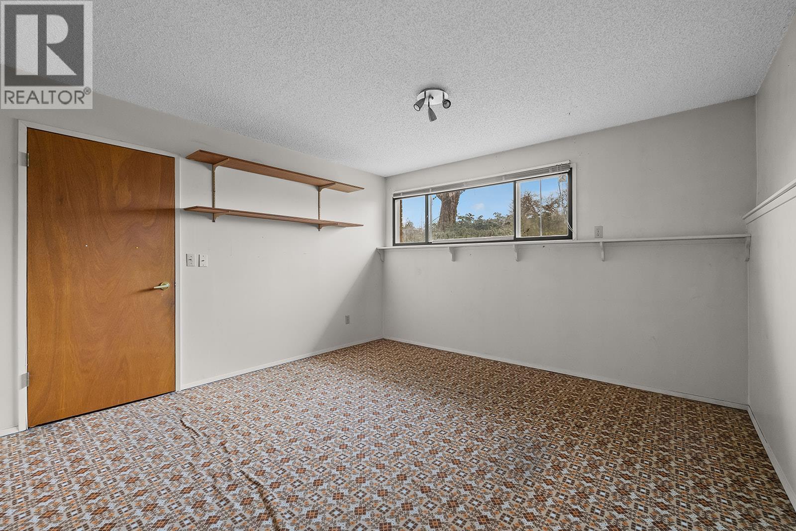 1424 Lombardy Square, Kelowna, BC - Indoor Photo Showing Other Room
