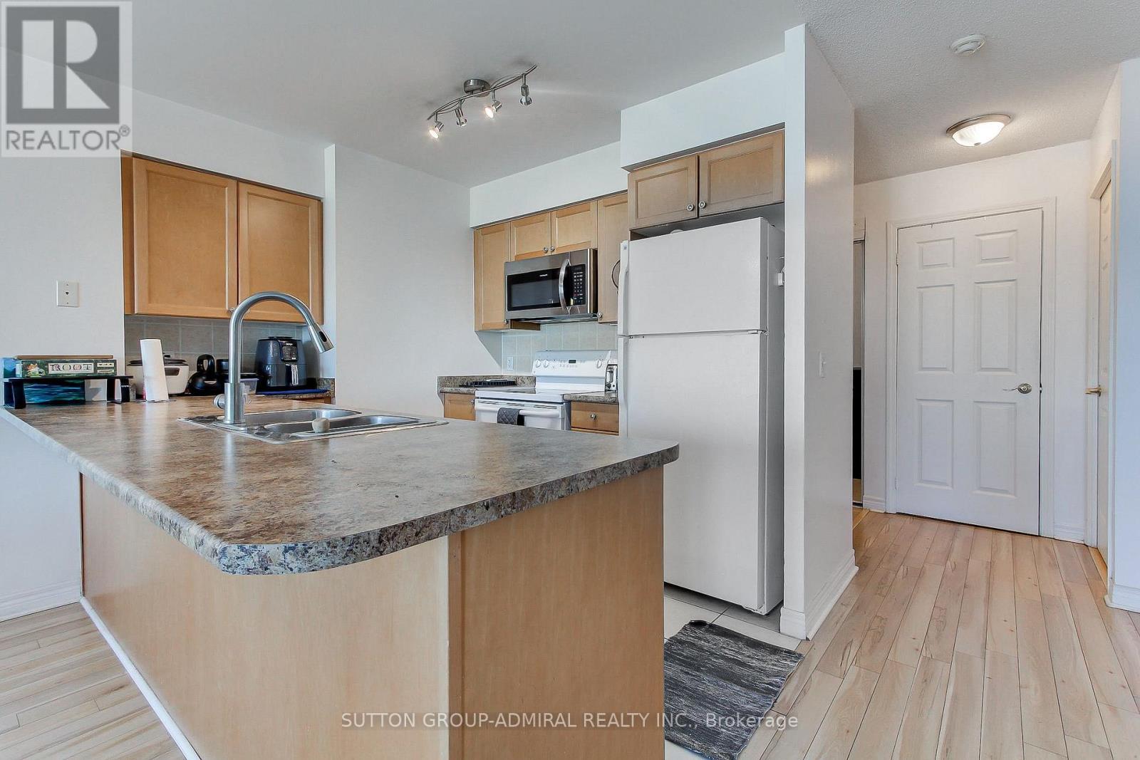 30 Grand Trunk Crescent, Toronto, ON - Indoor Photo Showing Kitchen With Double Sink