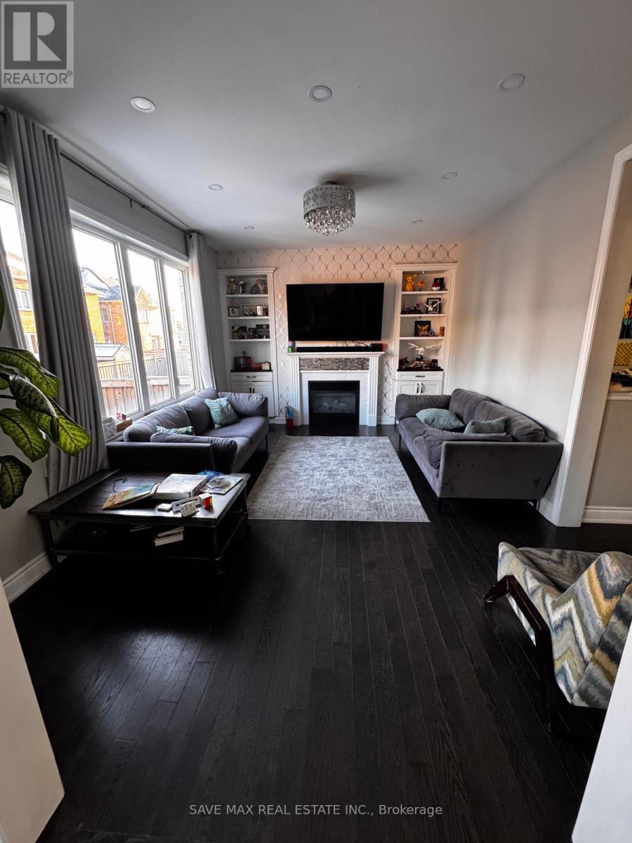 7 Lampman Crescent, Brampton, ON - Indoor Photo Showing Living Room With Fireplace