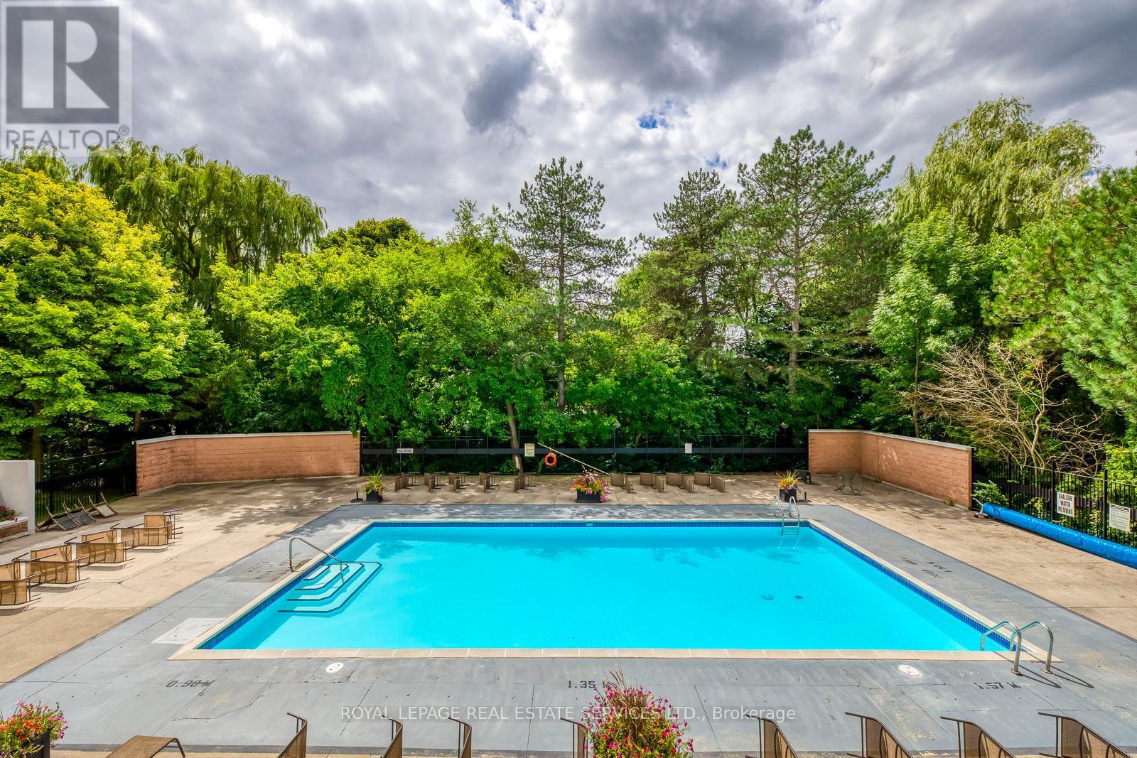405 - 240 Scarlett Road, Toronto, ON - Outdoor With In Ground Pool With Backyard