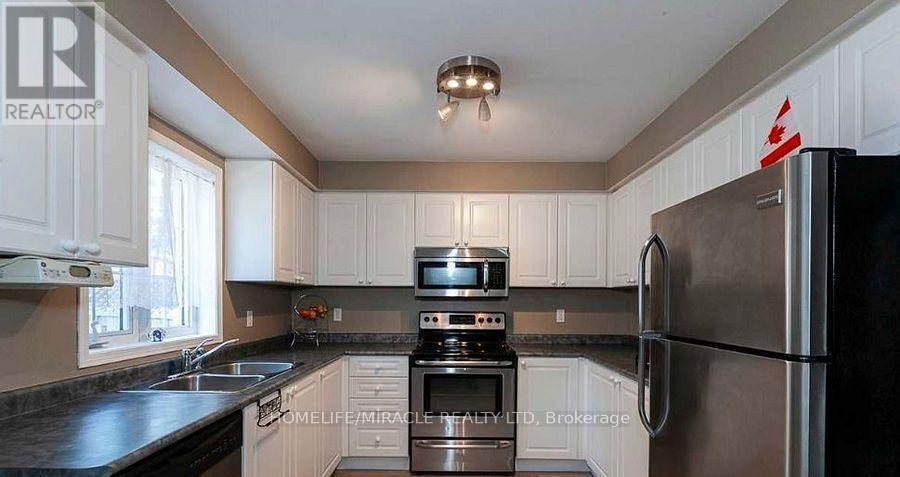 36 Bramcedar Crescent, Brampton, ON - Indoor Photo Showing Kitchen With Double Sink