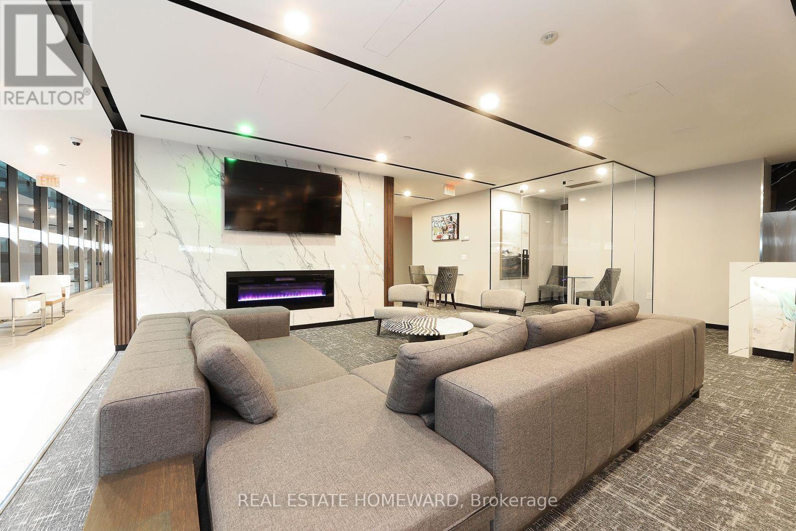 520 - 32 Trolley Crescent, Toronto, ON - Indoor With Fireplace