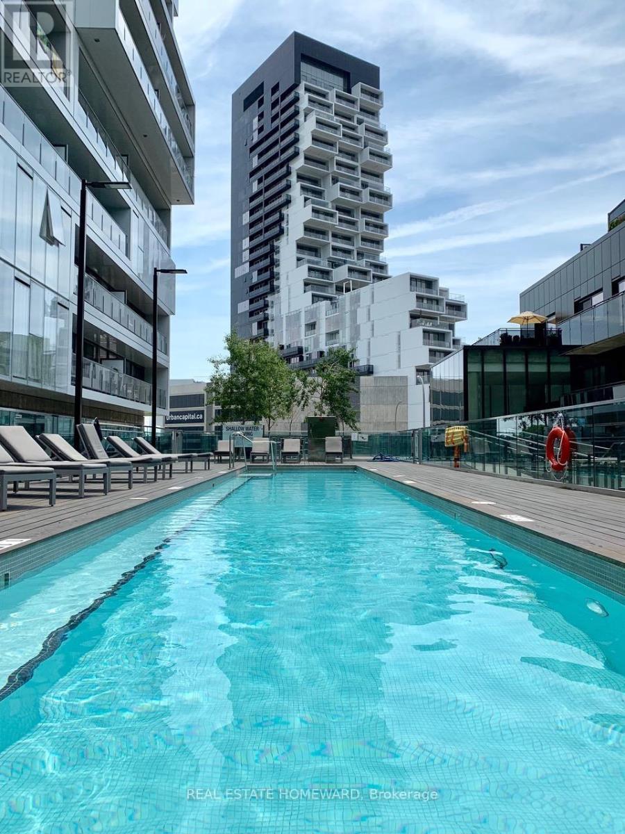 520 - 32 Trolley Crescent, Toronto, ON - Outdoor With In Ground Pool
