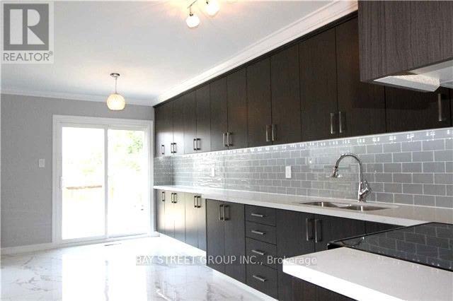 9 Charles Alfred Crescent N, Markham, ON - Indoor Photo Showing Kitchen With Double Sink
