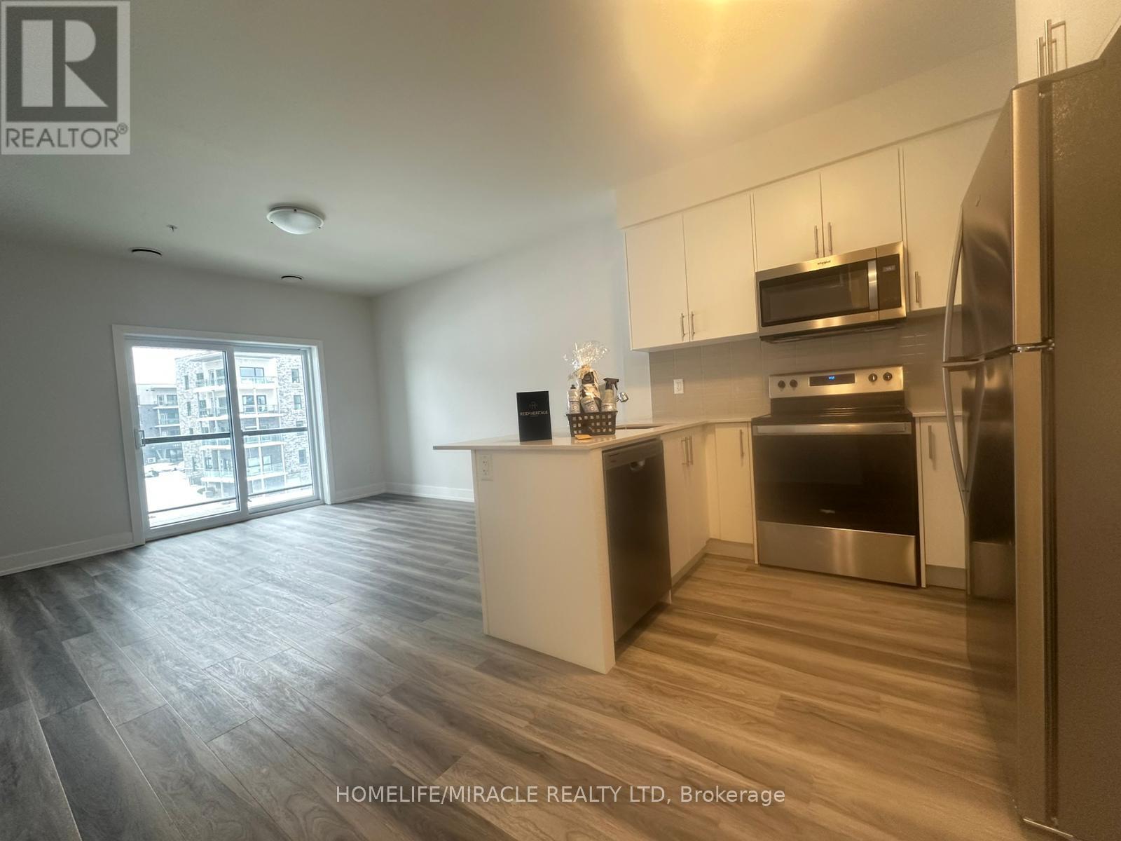 310 - 1100 Lackner Place, Kitchener, ON - Indoor Photo Showing Kitchen