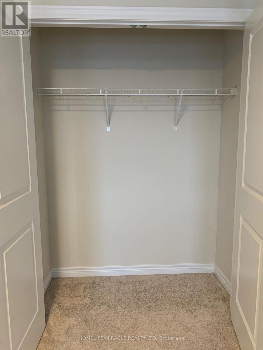 RM#3 Walk-in closet - 72 Clifford Crescent, New Tecumseth, ON - Indoor With Storage