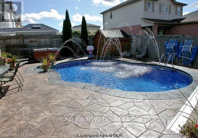 547 Forest Creek Place, London East (East A), ON - Outdoor With In Ground Pool With Deck Patio Veranda