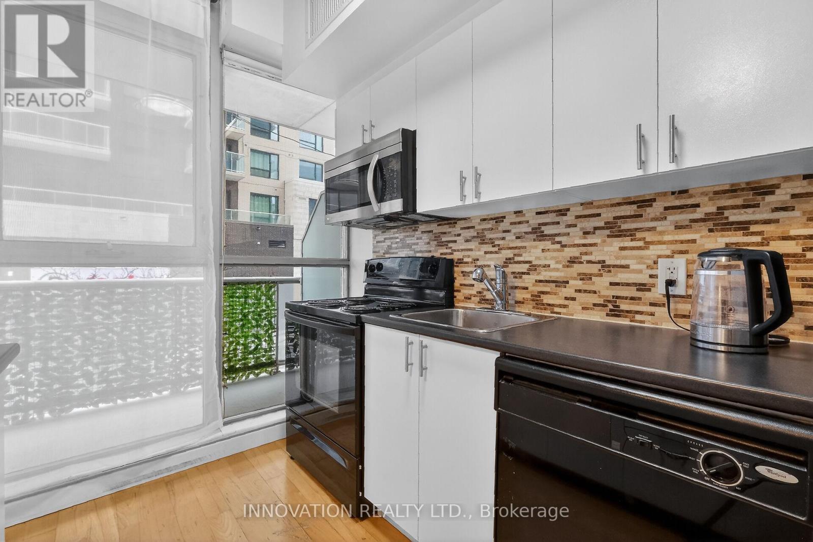 201 - 179 George Street, Ottawa, ON - Indoor Photo Showing Kitchen With Double Sink
