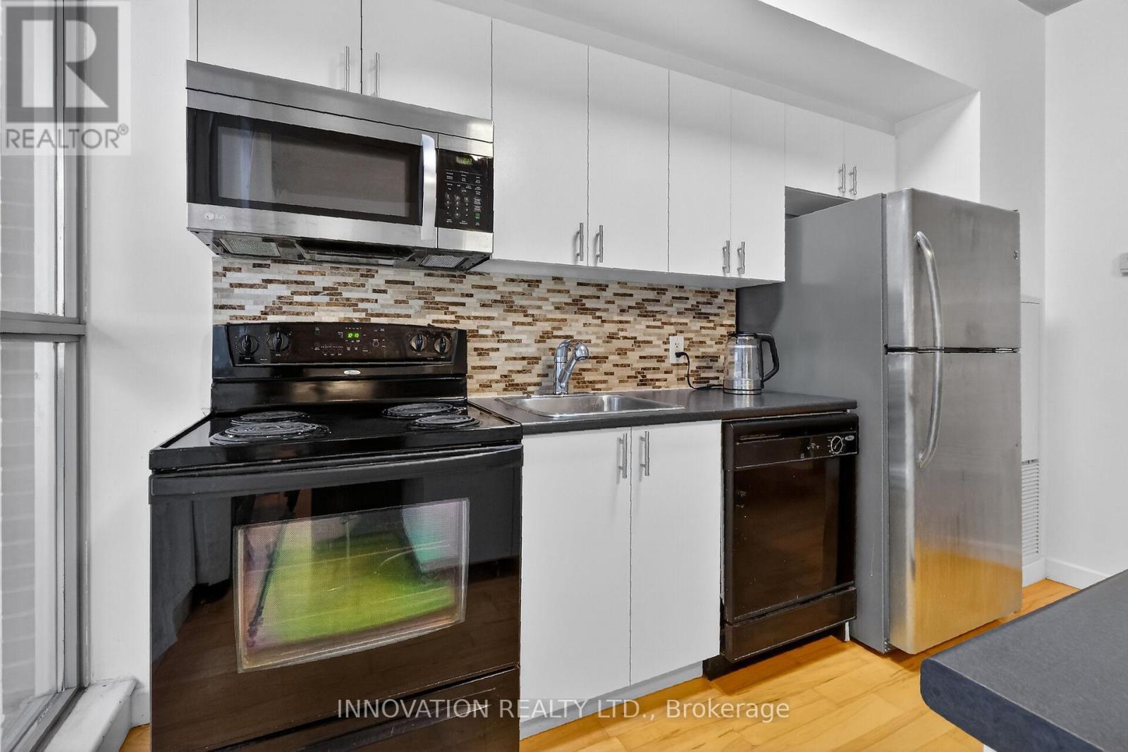 201 - 179 George Street, Ottawa, ON - Indoor Photo Showing Kitchen With Double Sink