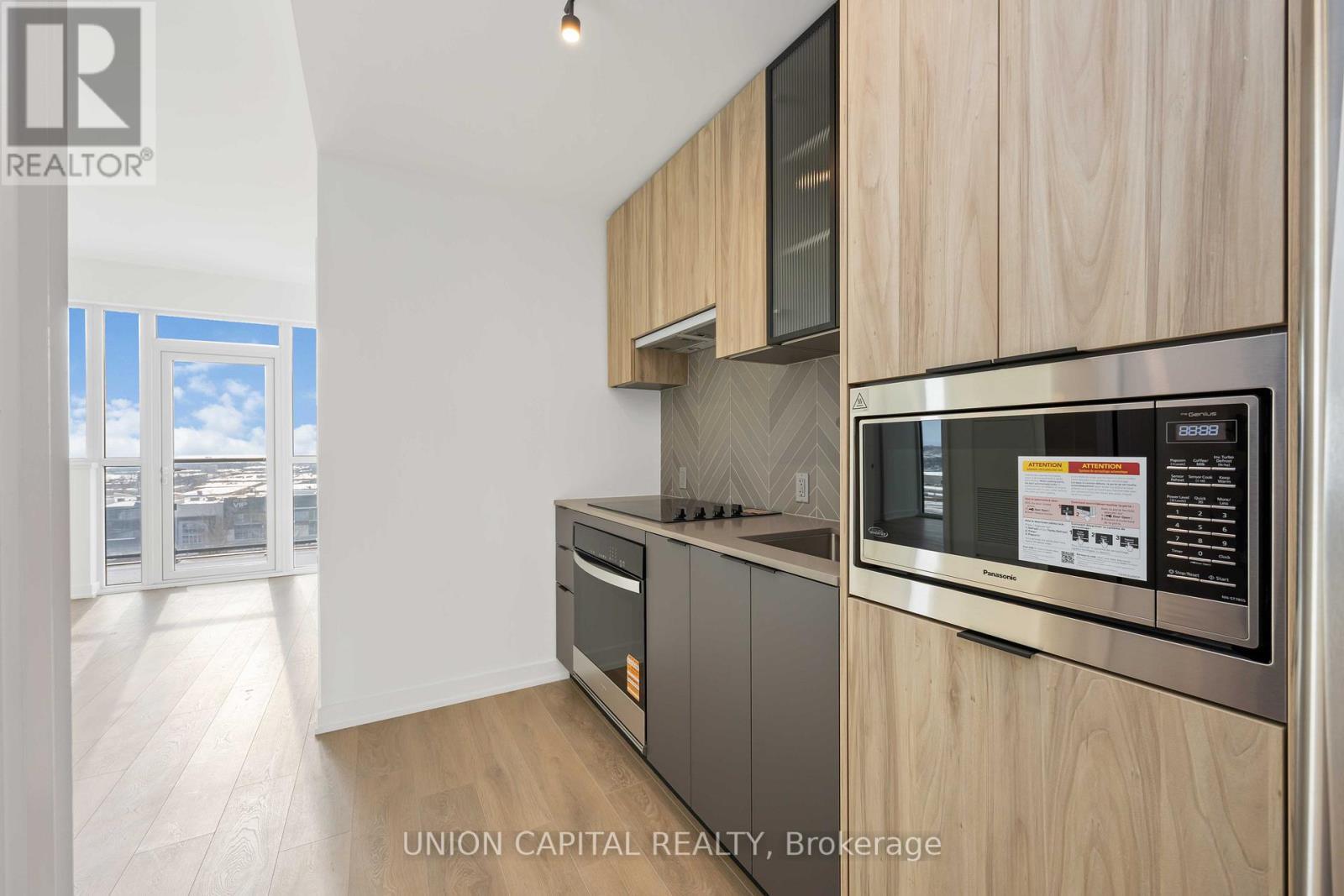 710 - 1037 The Queensway, Toronto, ON - Indoor Photo Showing Kitchen With Stainless Steel Kitchen