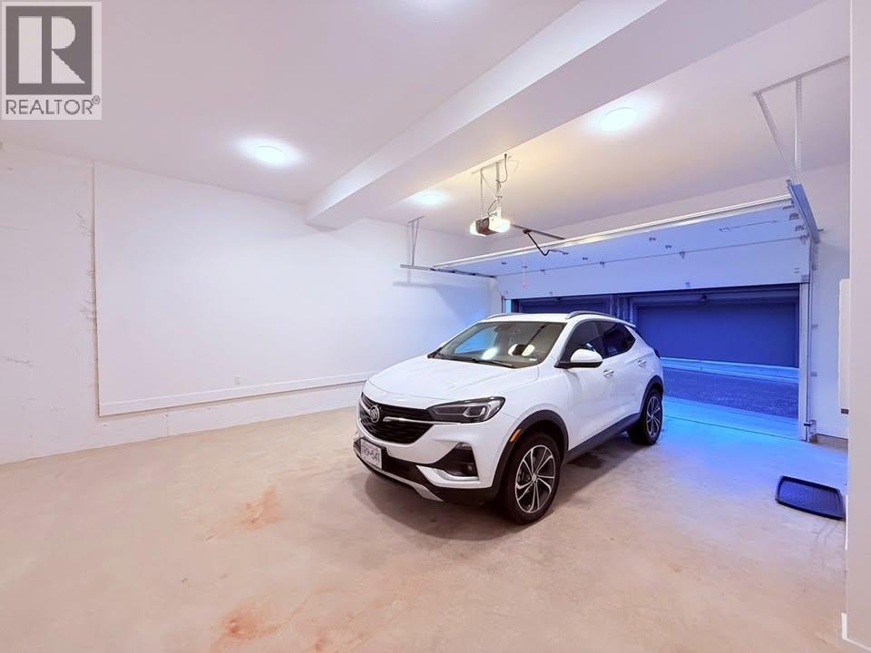 147 1340 Olmsted Street, Vancouver, BC - Indoor Photo Showing Garage