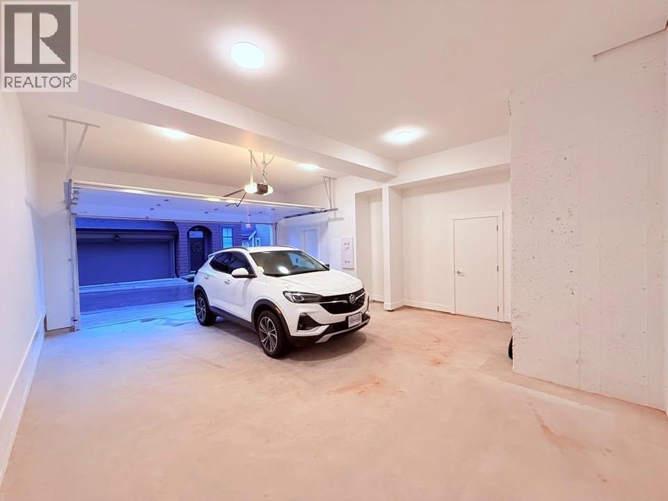 147 1340 Olmsted Street, Vancouver, BC - Indoor Photo Showing Garage