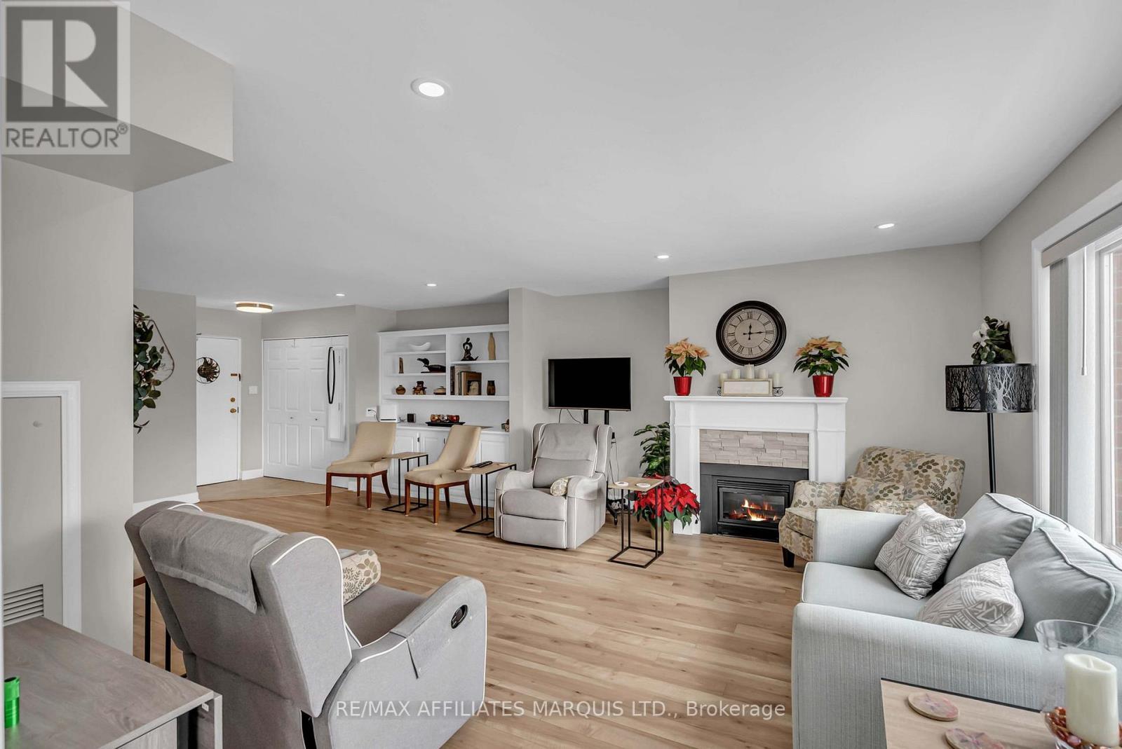 411 - 121 Water Street W, Cornwall, ON - Indoor Photo Showing Living Room With Fireplace