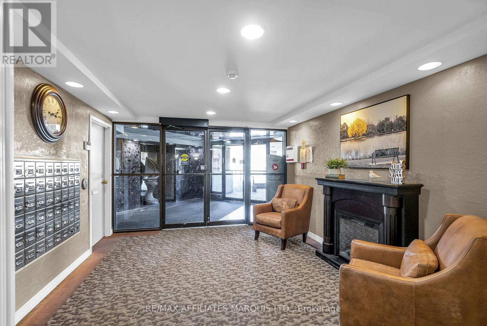 411 - 121 Water Street W, Cornwall, ON - Indoor Photo Showing Other Room With Fireplace