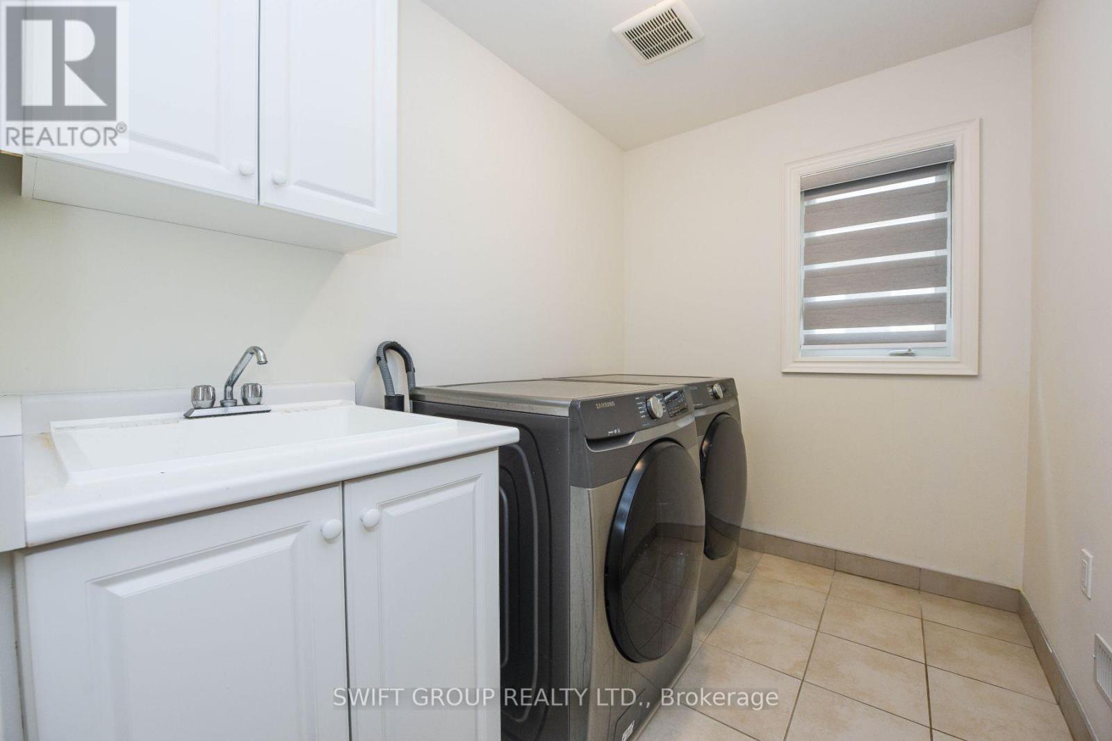 Upper - 24 Dotchson Avenue, Caledon, ON - Indoor Photo Showing Laundry Room
