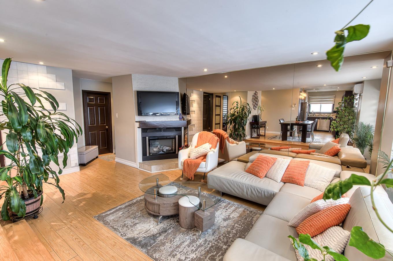 Living room - 10-3055 Place Alton-Goldbloom, Laval (Chomedey), QC - Indoor Photo Showing Living Room With Fireplace
