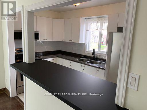 4 Juliana Square, Brampton, ON - Indoor Photo Showing Kitchen With Double Sink