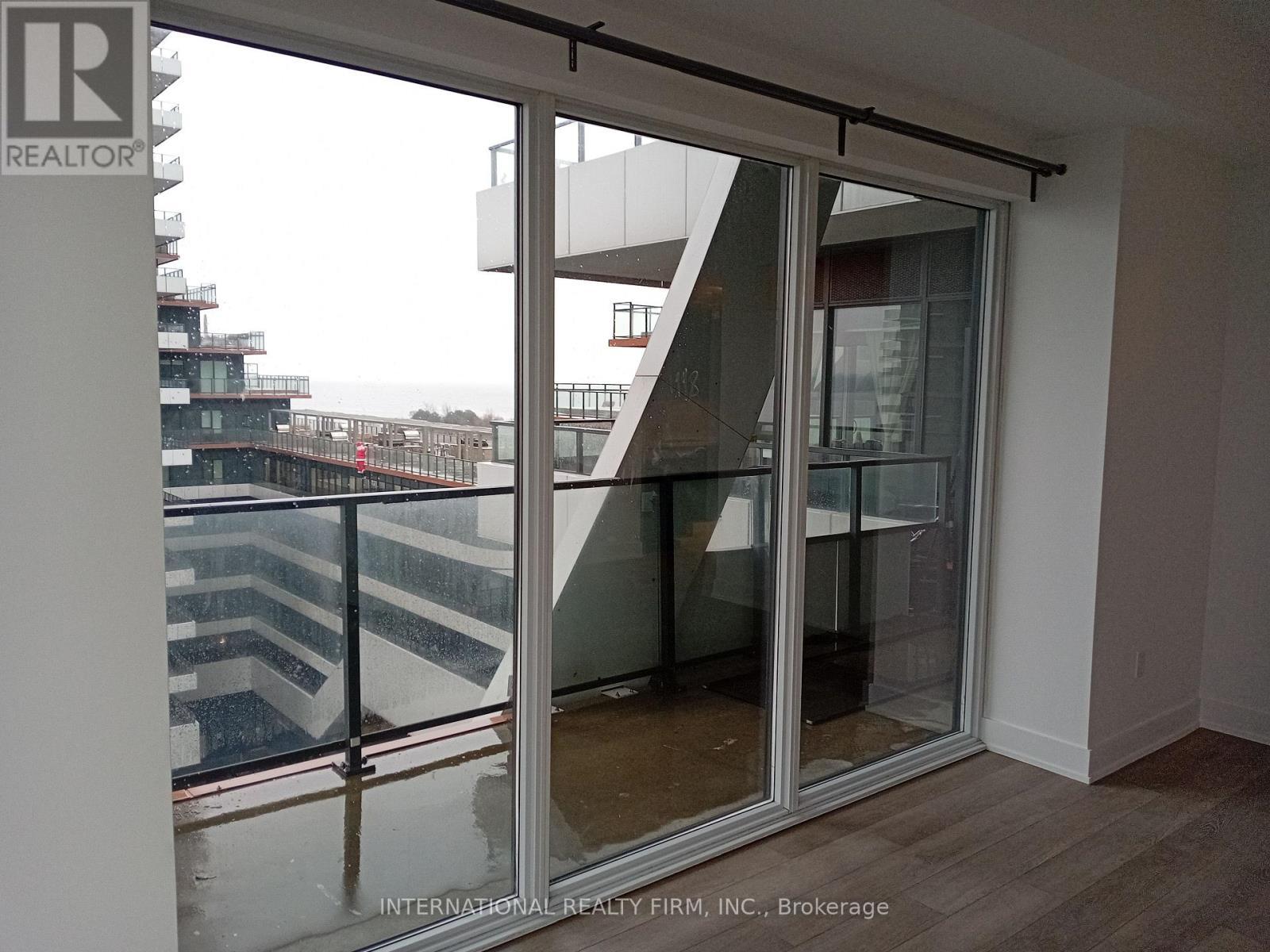 South West Winter View - 816 - 30 Shore Breeze Drive, Toronto, ON - Outdoor With Balcony With Exterior