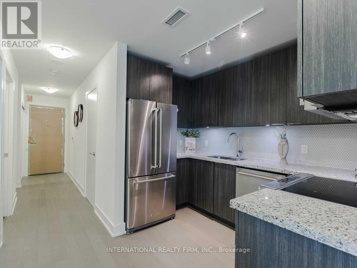 New Fridge Still Wrapped - 816 - 30 Shore Breeze Drive, Toronto, ON - Indoor Photo Showing Kitchen With Upgraded Kitchen