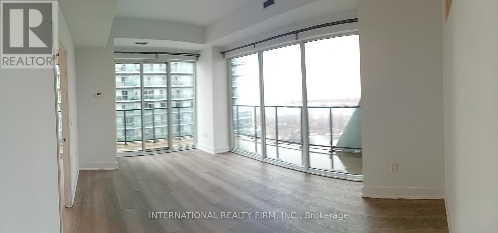 Living Room and Dining Room - 816 - 30 Shore Breeze Drive, Toronto, ON - Indoor Photo Showing Other Room