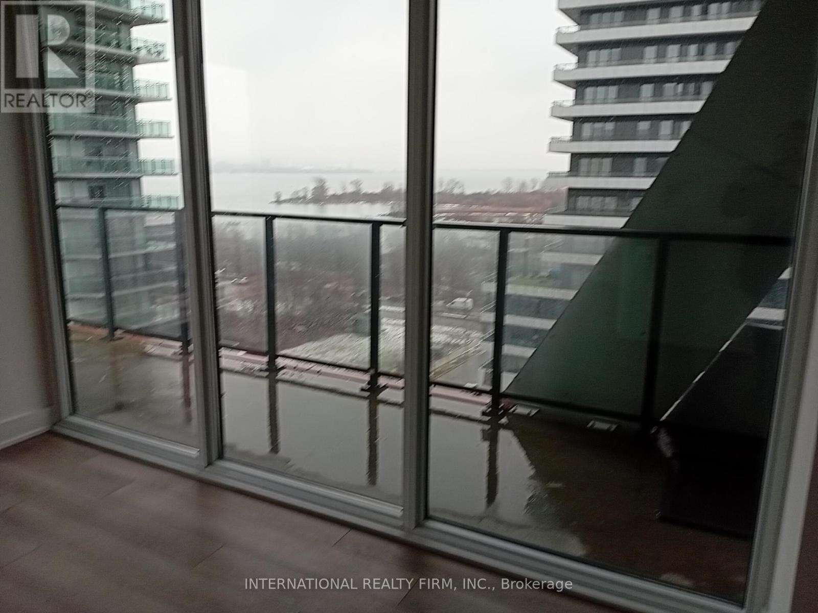 South East Winter View with CN Tower - 816 - 30 Shore Breeze Drive, Toronto, ON - Outdoor With Balcony