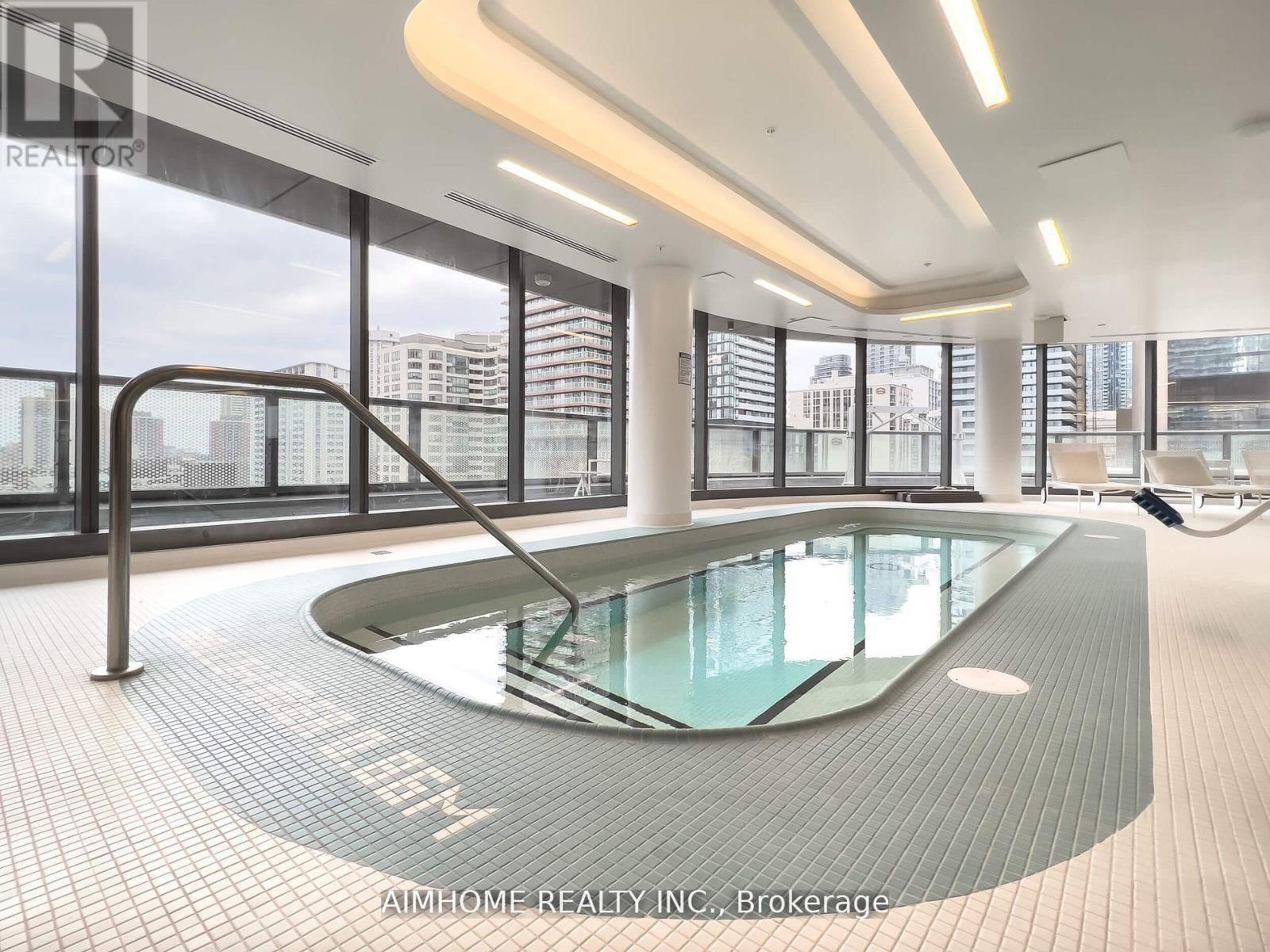 4011 - 11 Wellesley Street W, Toronto, ON - Indoor Photo Showing Other Room With In Ground Pool