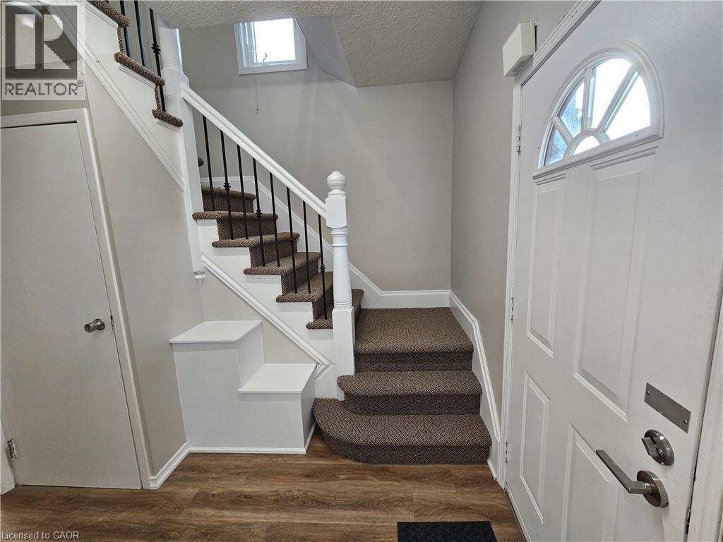 another view showing front door and stairs to second floor - 100 E Lancaster Street E, Kitchener, ON