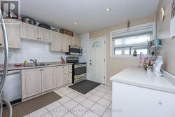 Walkway to SUNROOM & BACKYARD -