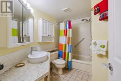 Full bathroom right off of the foyer -