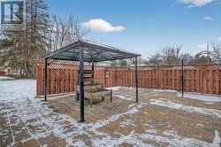Interlock patio with hot tub wire accessible -