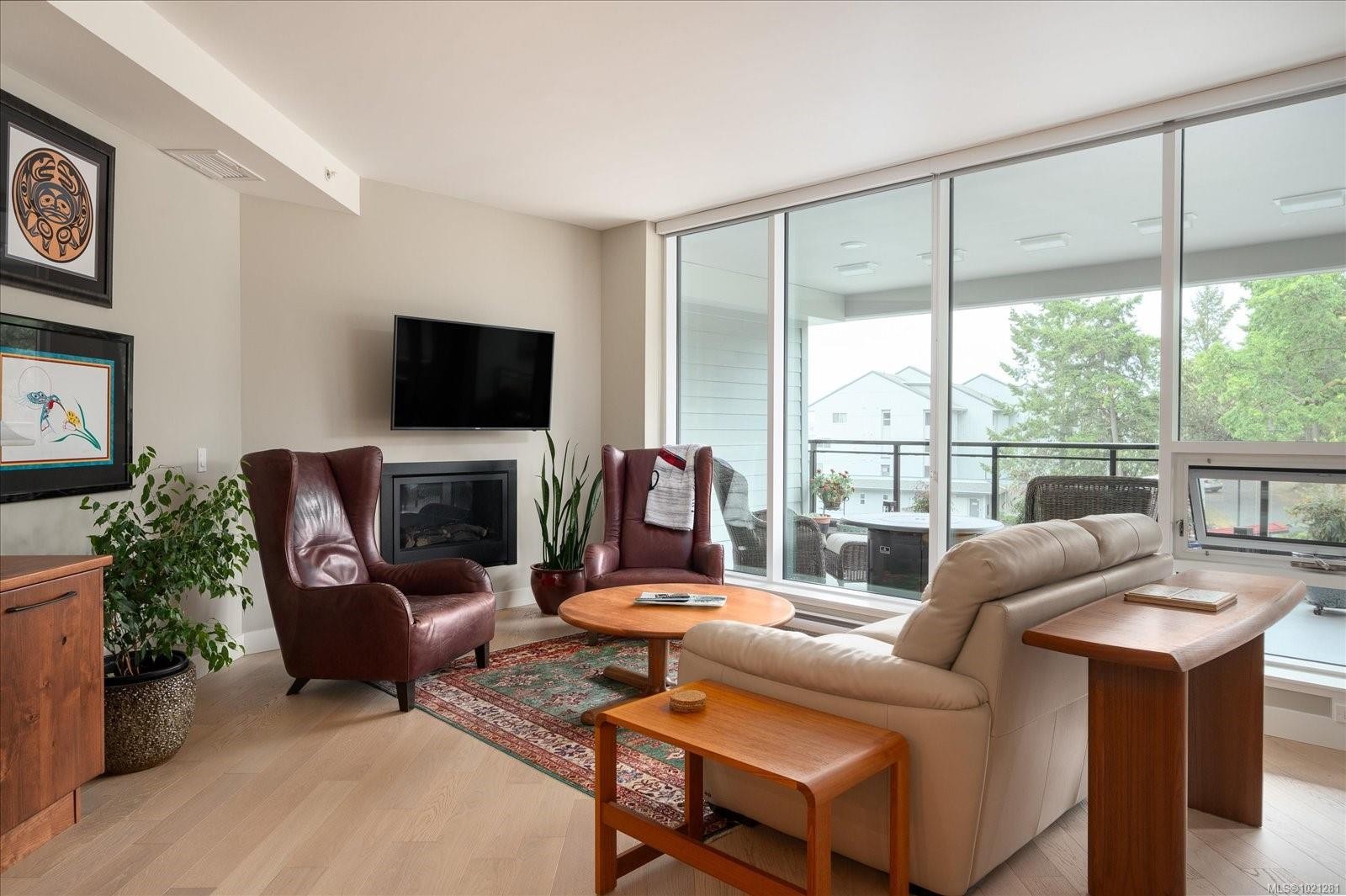 305-3529 Dolphin Dr, Nanoose Bay, BC - Indoor Photo Showing Living Room With Fireplace